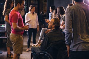 Group of People Drinking and Talking